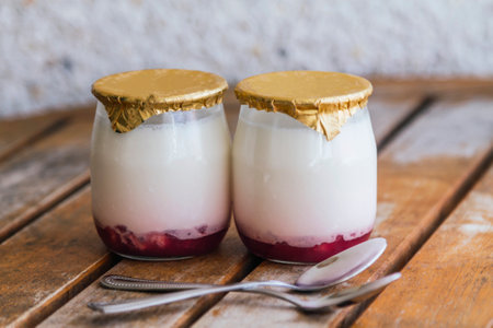Greek yogurt in a glass jarsの写真素材