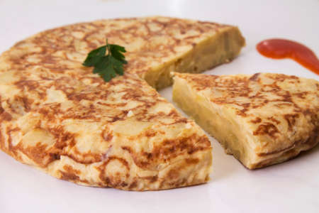 Spanish omelette with potatoes and onion, typical Spanish cuisine. Spanish tortillaの写真素材