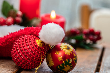 Christmas balls with candles in the background. merry christmas and happy new year conceptの写真素材