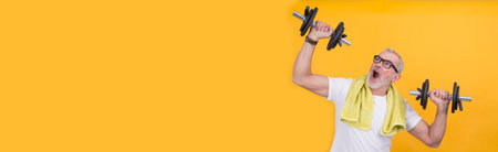 man working out with dumbbells with copy spaceの写真素材