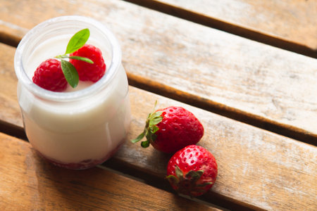 dairy dessert - yogurt with fresh strawberries in a glassの写真素材