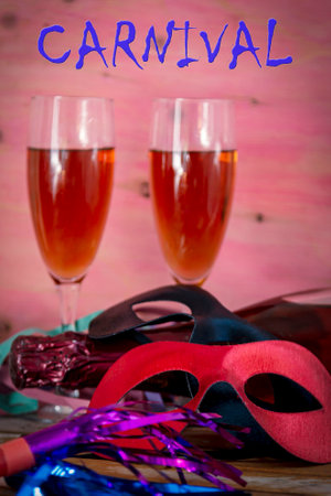 Glasses with champagne and Venetian maskの写真素材