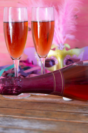 carnival mask and glass of champagne with copy spaceの写真素材