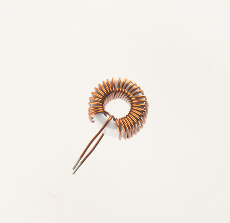 Copper coils isolated on white backgroundの写真素材