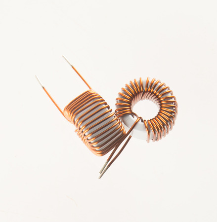 Copper coils on white backgroundの写真素材