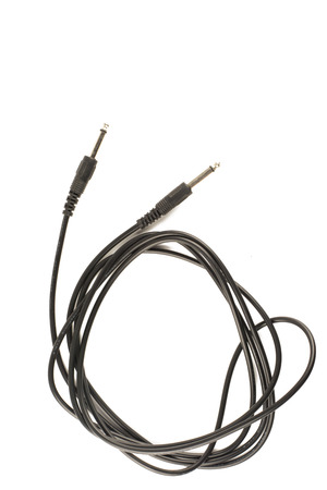 Guitar audio jack with black cable isolated on white background