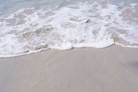 Wave of the sea on the sand beach