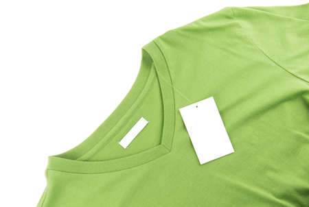 Green T-shirt and blank label.の写真素材