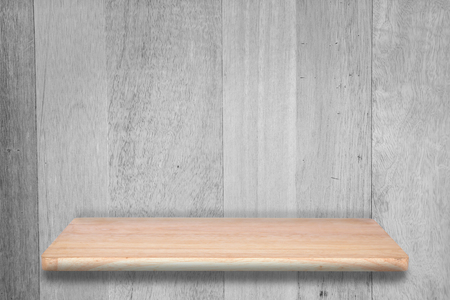 Empty top of wooden shelf isolated on white background. For product displayの写真素材