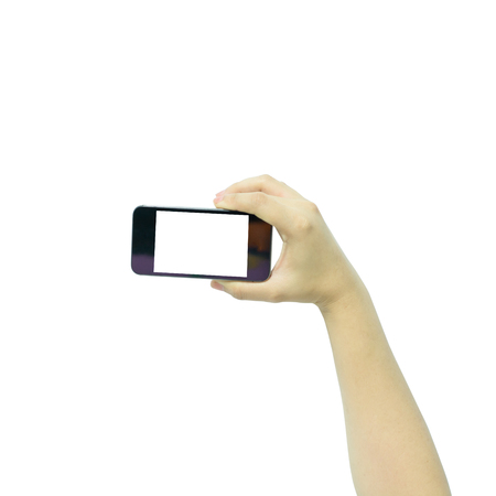 Woman hand holding the black smartphone with blank screen, isolated on white background.の写真素材