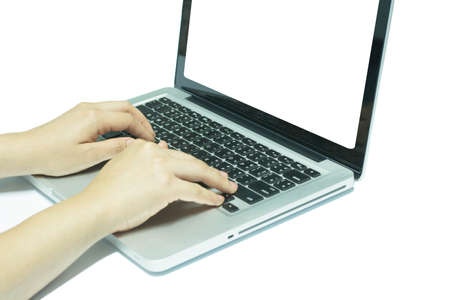 hands working on the laptopの写真素材