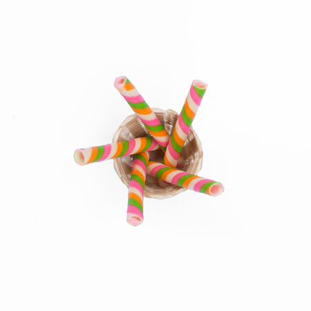 Colorful waffle stick in bamboo Basketの写真素材
