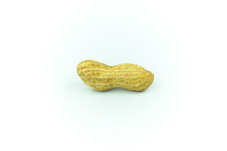 Dried peanuts isolated on whiteの写真素材