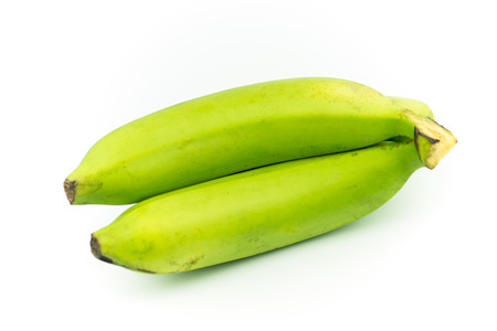 green bananas isolated on white backgroundの写真素材
