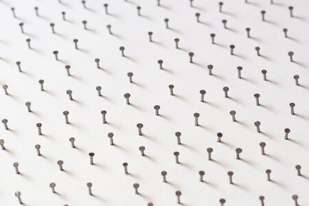 Group of Concrete nails Galvanized dip color on white paper backgroundの写真素材
