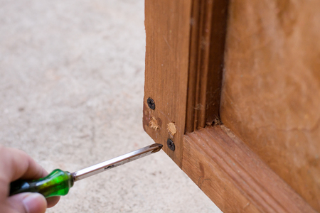 screwdriver in a wood constructionの写真素材