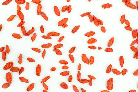 heap of goji berries isolated on white backgroundの写真素材