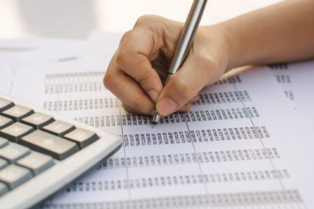 Business concept : Financial accounting stock market graphs analysis.
