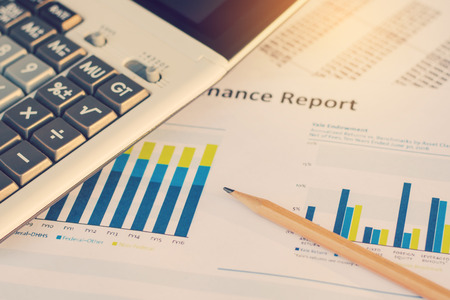 Business concept : Financial accounting stock market graphs analysis.