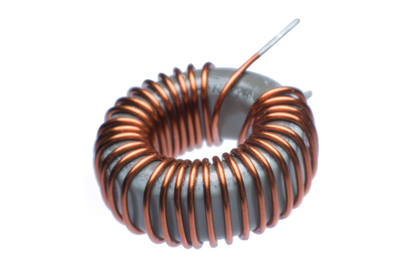 Close up inductor copper coils isolated on white background