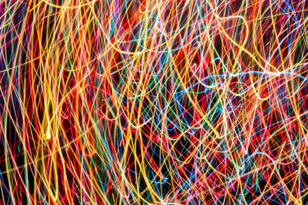 Colorful lights on the long exposure with motion background, Abstract glowing colorful lines, slow speed shutterの写真素材