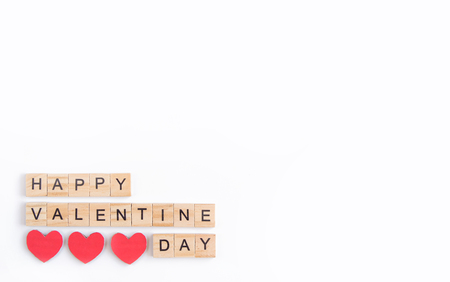 Alphabet letter wooden blocks tiles Valentine`s day on white background, Valentine concept, copy spaceの写真素材