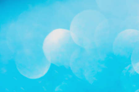 Defocused blue glitter background. blue abstract bokeh background. Christmas abstract background