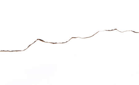 Paper burned old grunge on white backgroundの写真素材