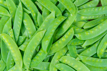 green snow pea pods background