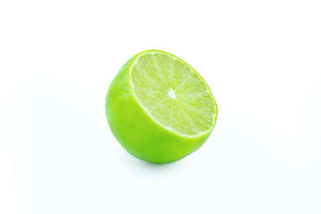 Lime with slices half isolated on white background. Green citrus fruit.の写真素材