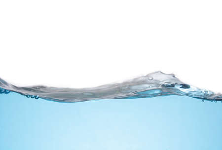 Clean light blue water wave isolated on white backgroundの写真素材