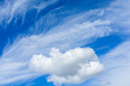 Cirrus and cumulus clouds on blue sky background.の写真素材
