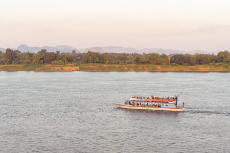 NAKHON PHANOM, THAILAND - NOV 27, 2020 : Tourist boat in Mekong river Nakhon phanom Thailand to Laoのeditorial素材