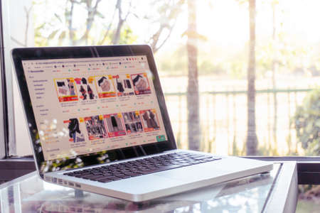 Online shopping website on laptop. Home shoppingの写真素材