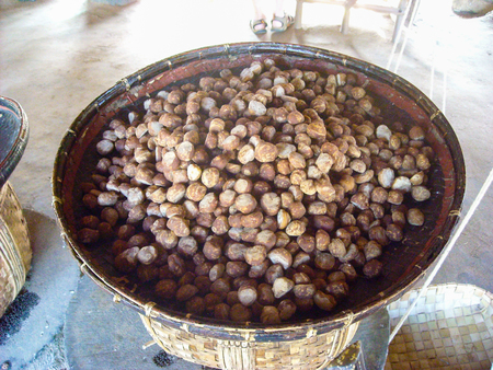 a basket with grain in burma marketの写真素材