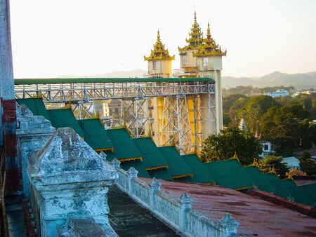 a temple in burma with golden roofの写真素材