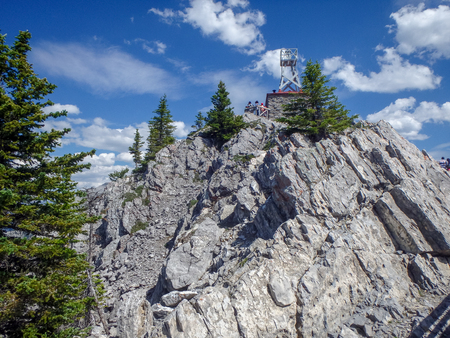 a small house at the top of the mountains in canadaの写真素材