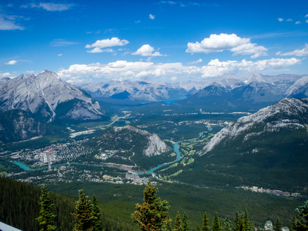 view to a valley in the mountains in canadaの写真素材
