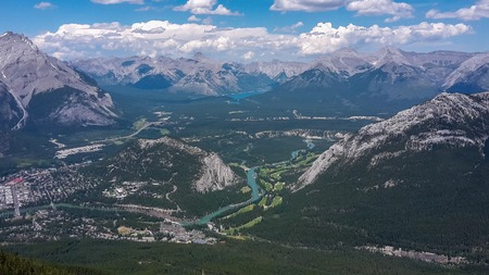 view to a valley in the mountains in canadaの写真素材