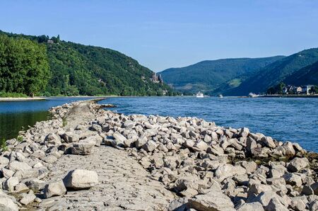 a path of stone in a river