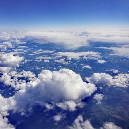 the blue sky with clouds in summertime