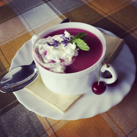 a cup of tea on a table after mealの写真素材