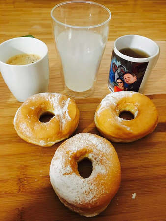 donuts with coffee and waterのeditorial素材