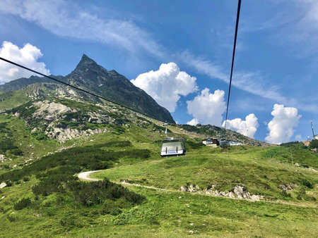 a cable car on the mountain at summer