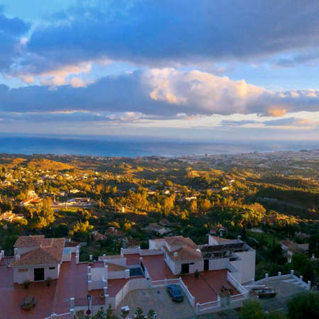 View to a valley from the mountains topの写真素材