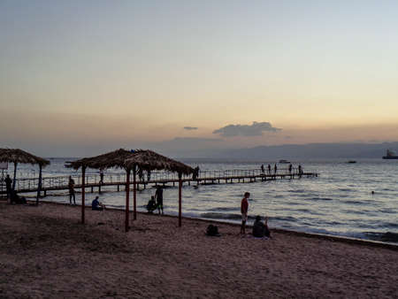 sunset over the beach in jordan at summertime
