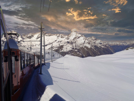 Cable car in the Swiss Alps at sunset, Grindelwald, Switzerlandの写真素材