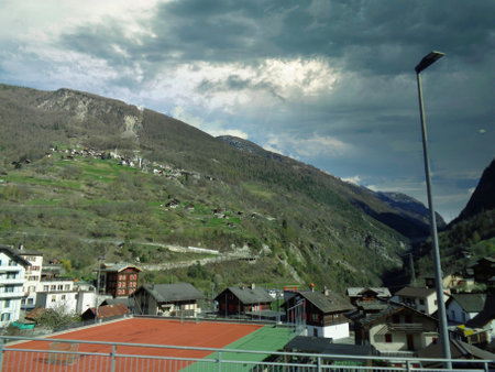 landscape in the swiss alps at summer with cloudy skyの写真素材