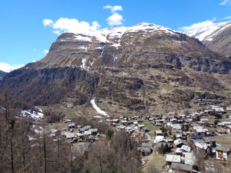 Mountain village in the Swiss Alps on a sunny winter day.の写真素材