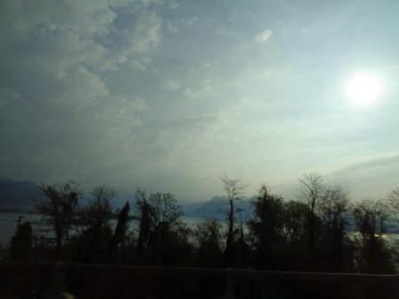 View from the car on the lake and mountains in the background.の写真素材